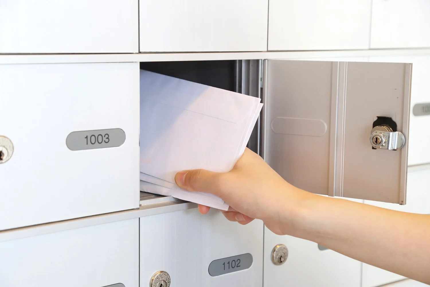 Open apartment/condo mailbox